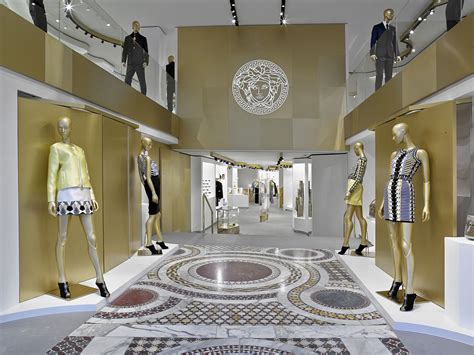 versace vitrine|Versace store interior design.